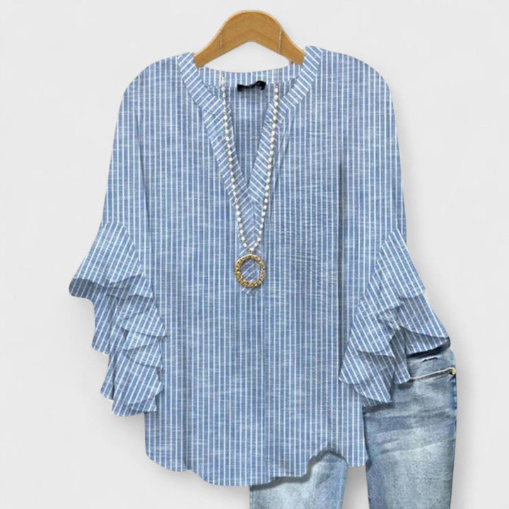 Effortless Floral Print Blouse for Women with V Neck Bell Sleeve Ruffled Relaxed Tunic Style